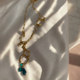 Collier en acier inoxydable maille large et pendentif amovible pampilles vertes émeraudes