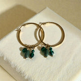 Créoles en acier inoxydable et pampilles vertes