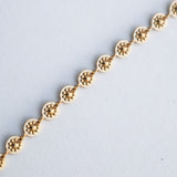 Bracelet doré en acier inoxydable Marguerite - Le Temps d'une Walima